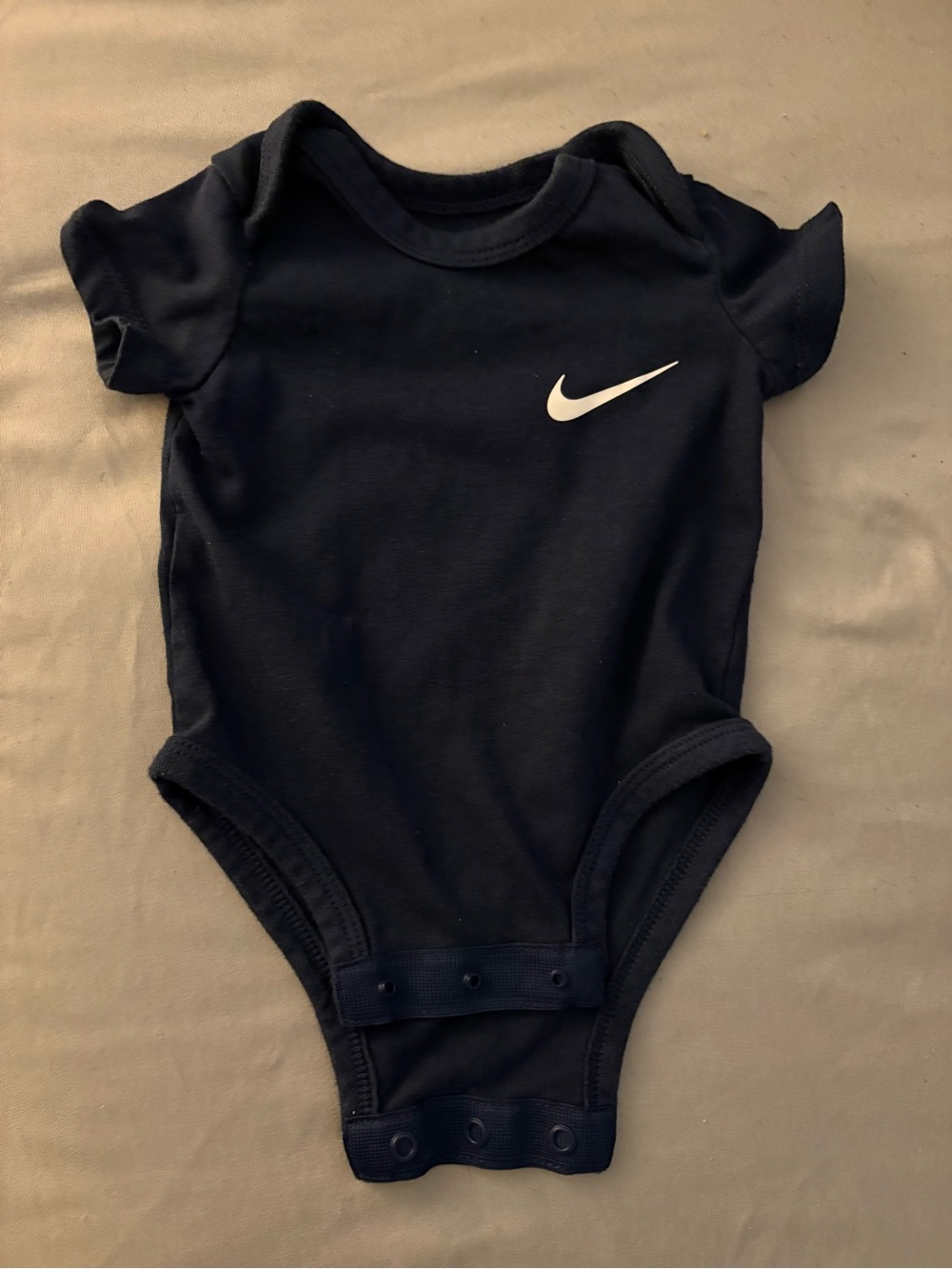 Nike Black Baby One-Piece Bodysuit with White Swoosh